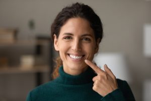 Dental Implants in lake forest ca, woman smiling after her dental implant placement